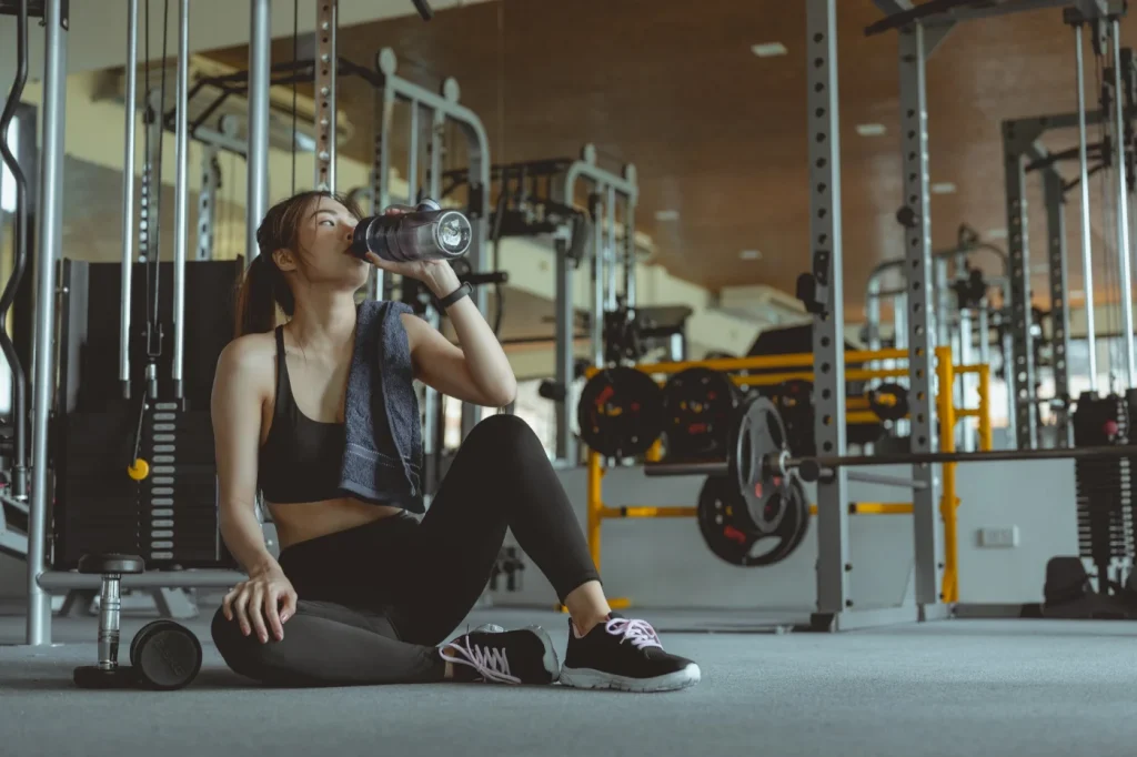 Girl Resting During Workout, Supporting Muscle Strength and Recovery, New Zealand Whey Protein