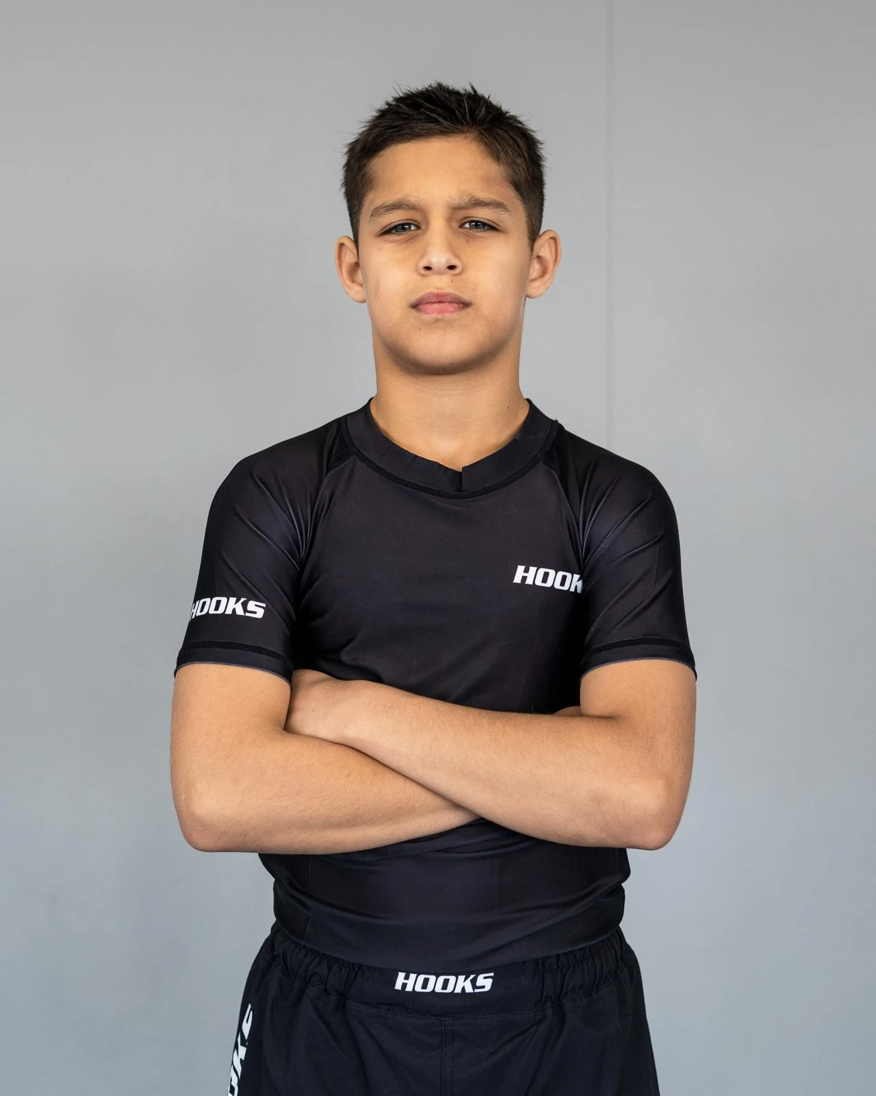 Mikail Tamoz posing with arms crossed in training gear