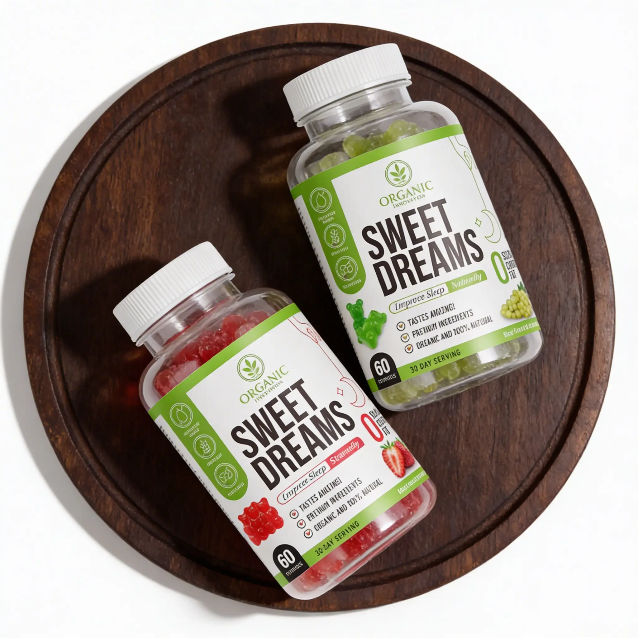 Organic Innovation Sweet Dreams melatonin gummies in strawberry and green grape flavors displayed on a round wooden tray