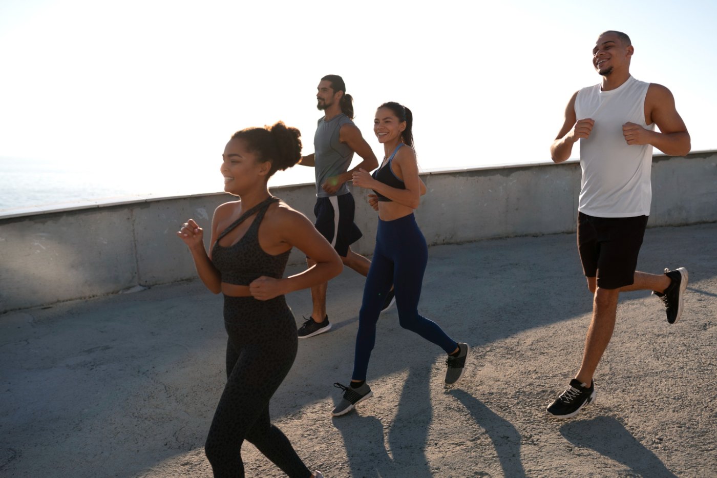 fit people going on a run during the day